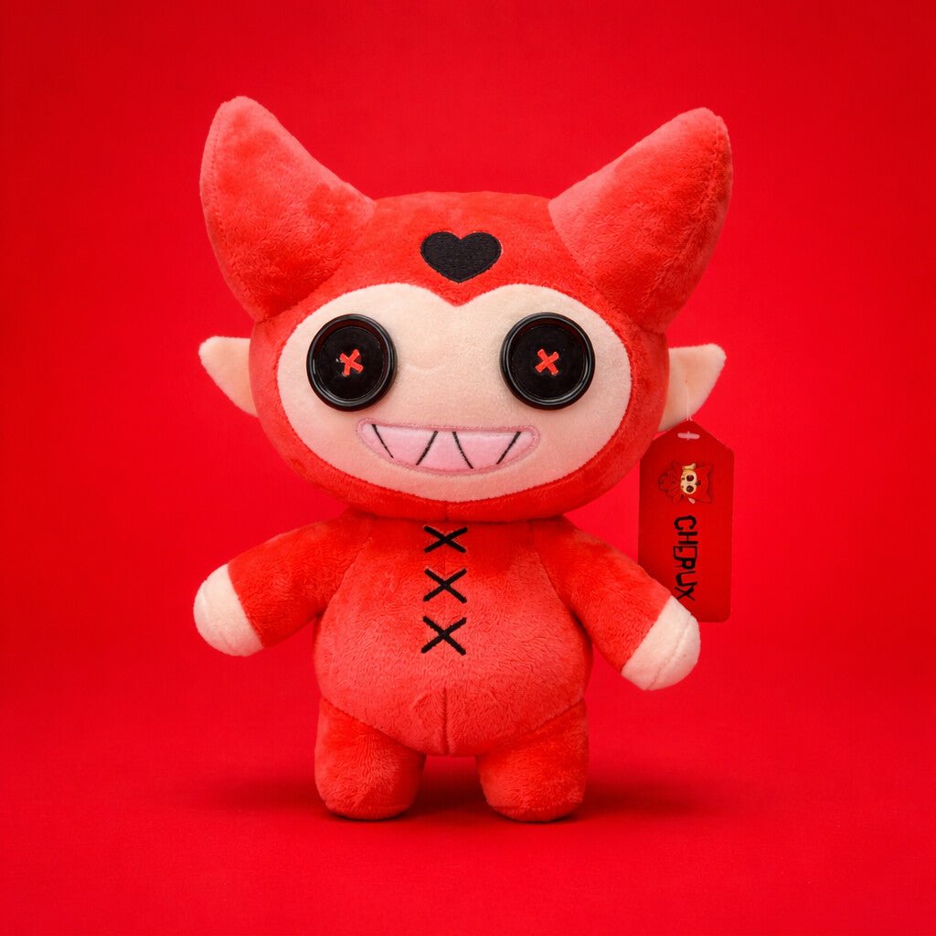 Red devil cupid plush toy with a tag on a red background