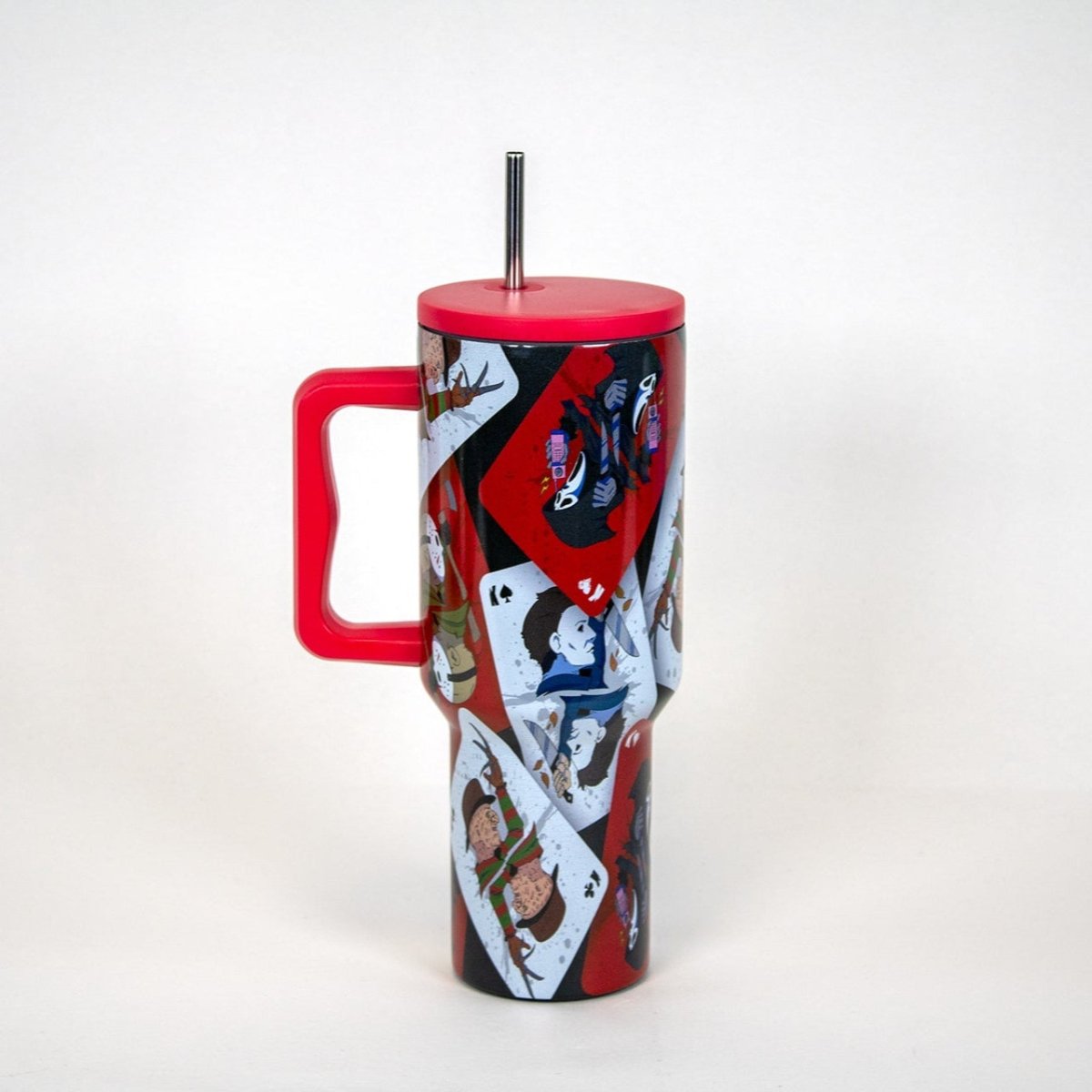 Horror tumbler with playing card design on a white background