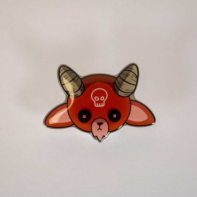 Red Horror Demon Goat with horns and a skull design on a light gray background
