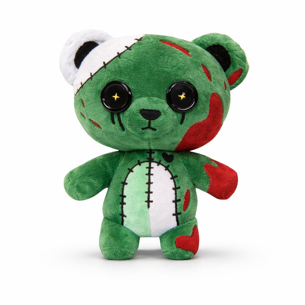 Green plush toy with red accents on a white background