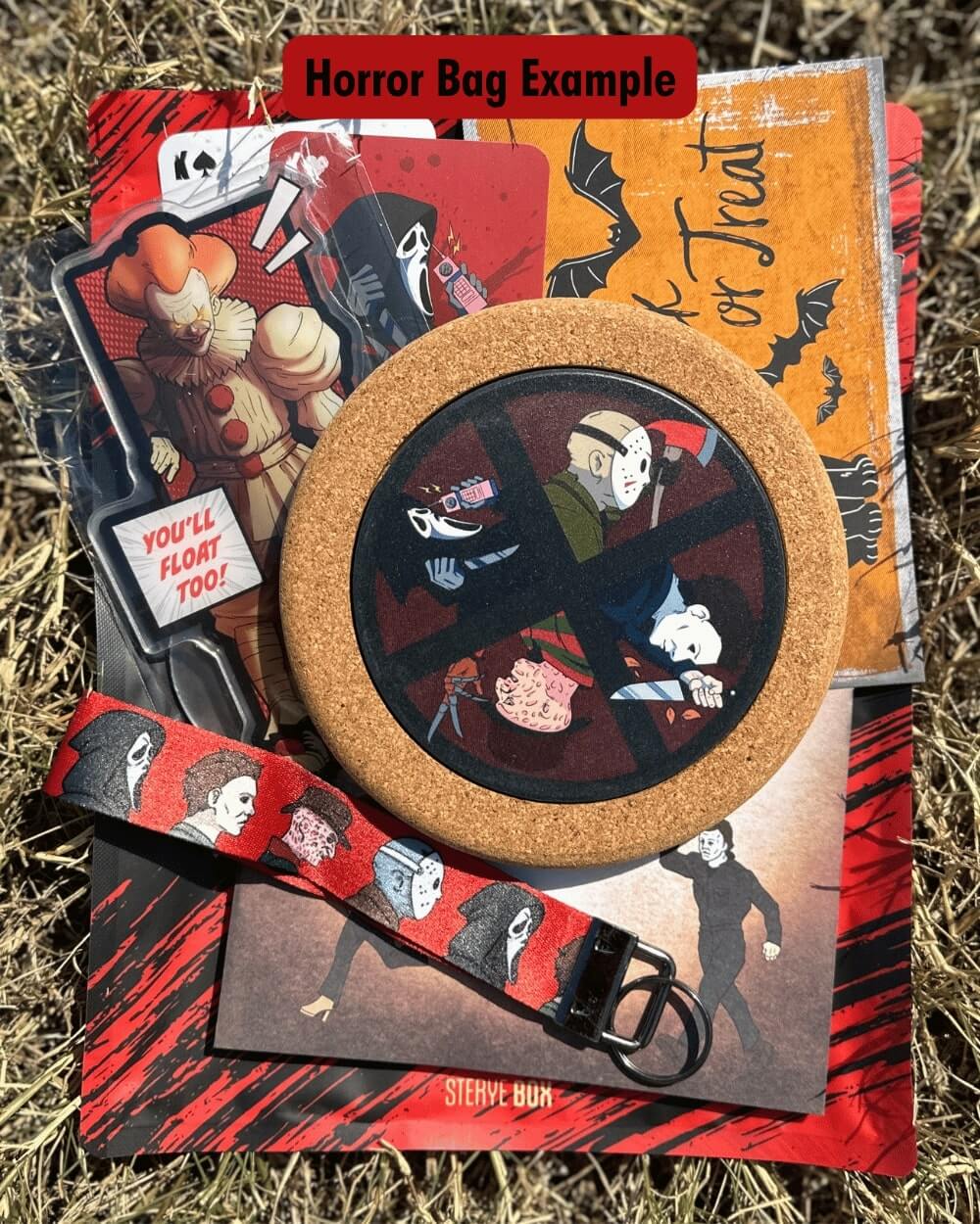 Horror-themed mystery bag with horror cards, bookmark, lanyard, coaster, and notepad.