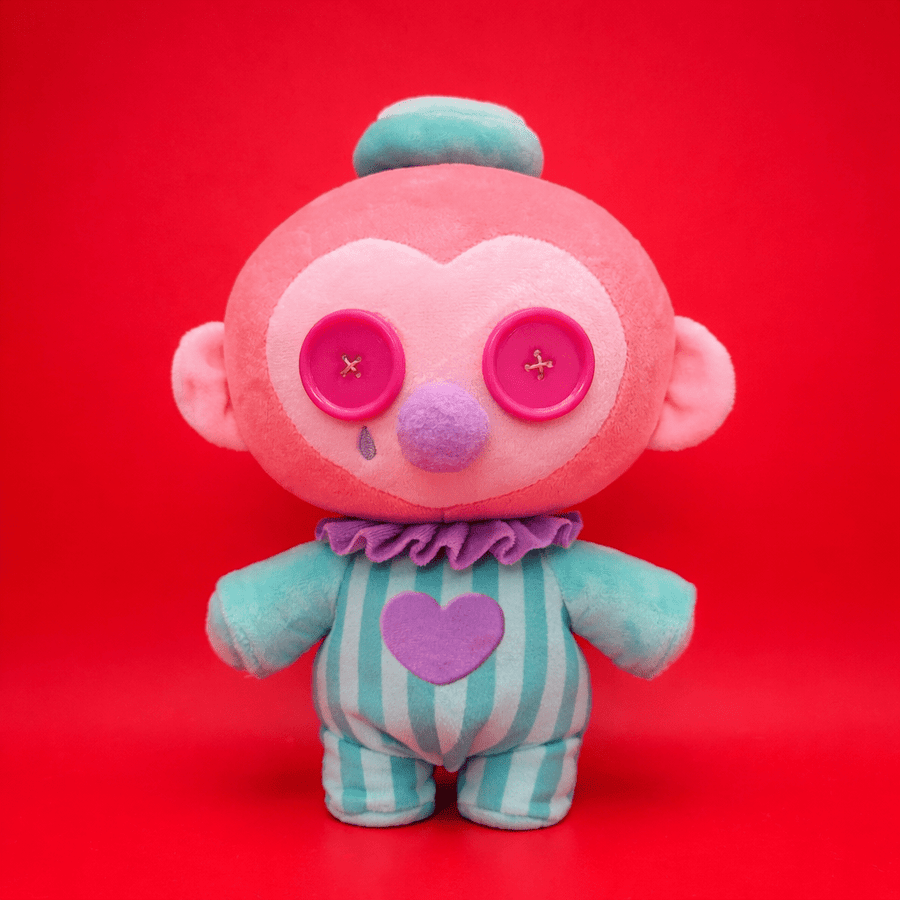 creepy pink Colorful stuffed animal monkey with a red background