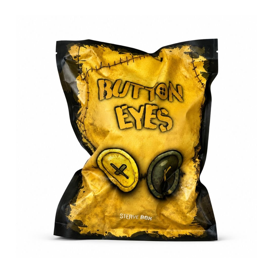 A novelty sterye box for bag, designed to look like a stitched yellow and black bag labeled 'BUTTON EYES' with illustrations of two button eyes on a white background.