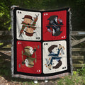 Quilt with horror playing card designs featuring characters on a wooden fence background