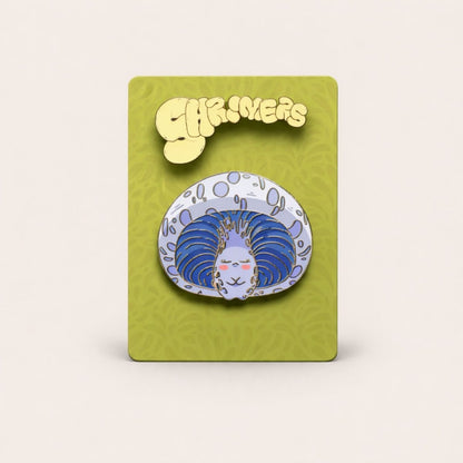 Pin with a blue and white design on a green card with 'Shroomers' branding.