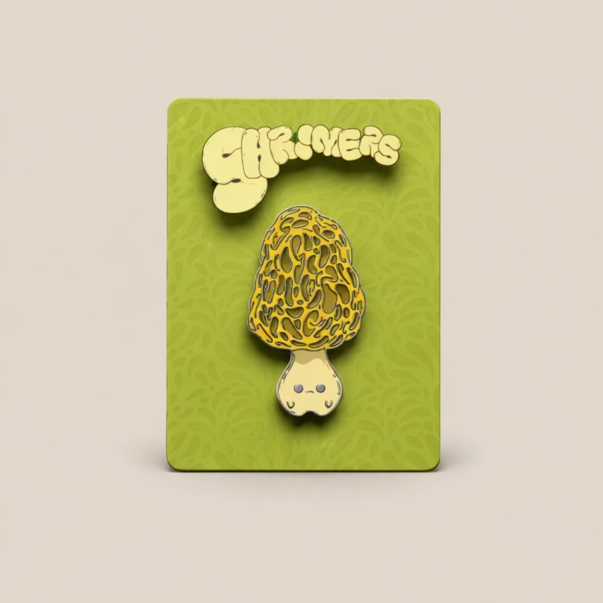 Gold mushroom-shaped pin on a green card with 'Shroomers' text