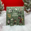 red background with snow featuring a creepmas style green sticker sheet