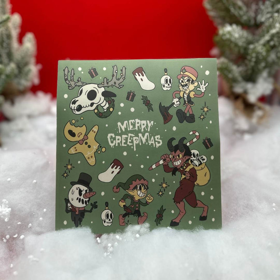 red background with snow featuring a creepmas style green sticker sheet